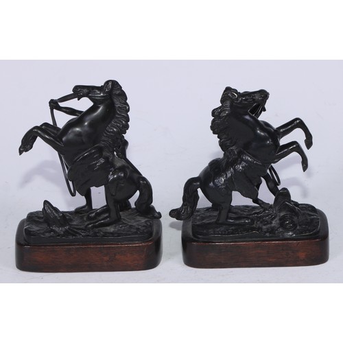 5230 - After Guillaume Coustou the Elder (1677 - 1746), a pair of dark patinated cabinet bronzes, the Horse... 