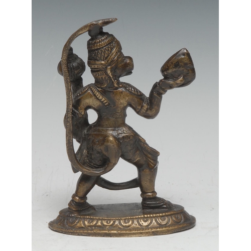 5335 - Indian School (19th/early 20th century), a bronze, of Hanuman, oval lotus base, 14cm high