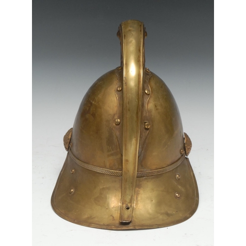 5315 - Fire Brigade History - a late 19th/early 20th century brass Merryweather pattern fireman's helmet, 2... 