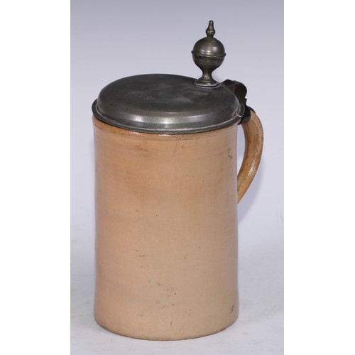 5238 - An 18th century pewter mounted English stoneware quart tankard, hinged cover with orb thumbpiece, 27... 