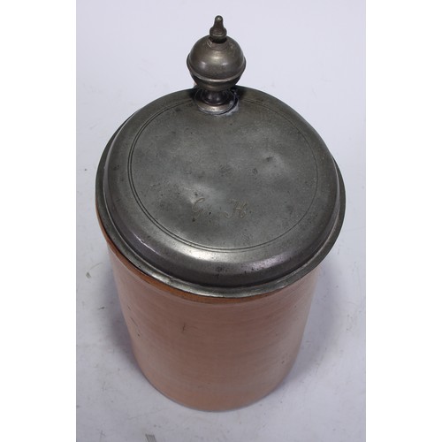 5238 - An 18th century pewter mounted English stoneware quart tankard, hinged cover with orb thumbpiece, 27... 