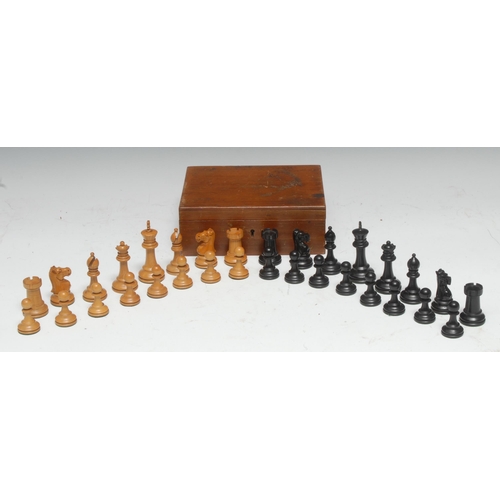 5065 - A boxwood and ebony Staunton pattern chess set, the Kings 7.5cm high, mahogany box