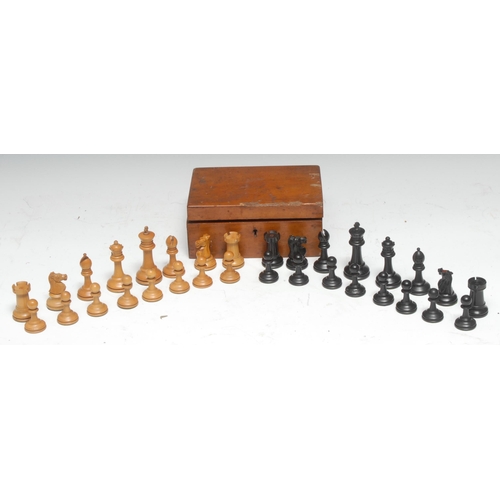 5064 - A boxwood and ebonised chess set, possibly Jaques, the pieces marked for King's side, the Kings 7.5c... 