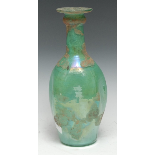 5284 - Antiquities - a glass amphora, loop handle, pontil scar to base, 27cm high