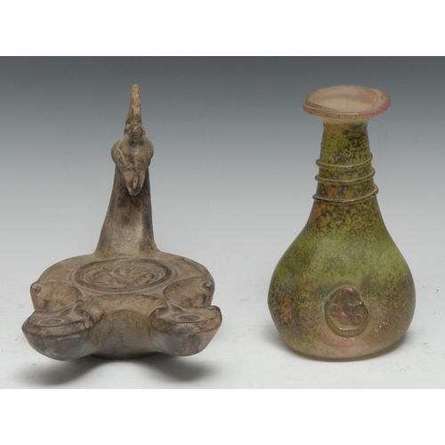 5114 - A Grand Tour type terracotta oil lamp, after the ancient Roman, avian mask cresting, 20cm long; a gl... 