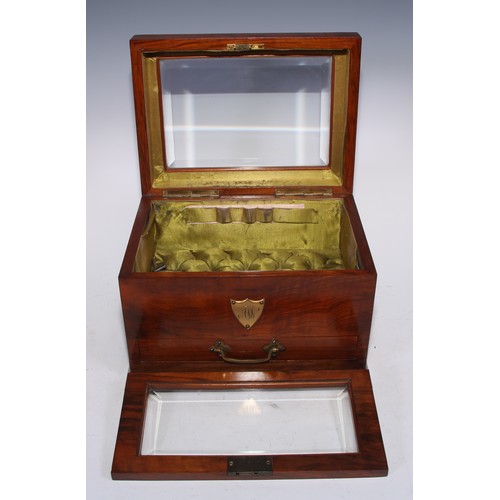 5222 - A Victorian walnut dressing table cabinet, glazed hinged cover and fall front with bevelled panes en... 