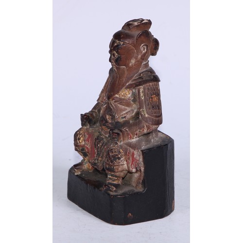 5077 - A Chinese polychrome carved figure, seated warrior, 14.5cm high