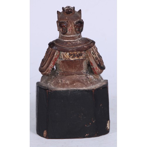 5077 - A Chinese polychrome carved figure, seated warrior, 14.5cm high