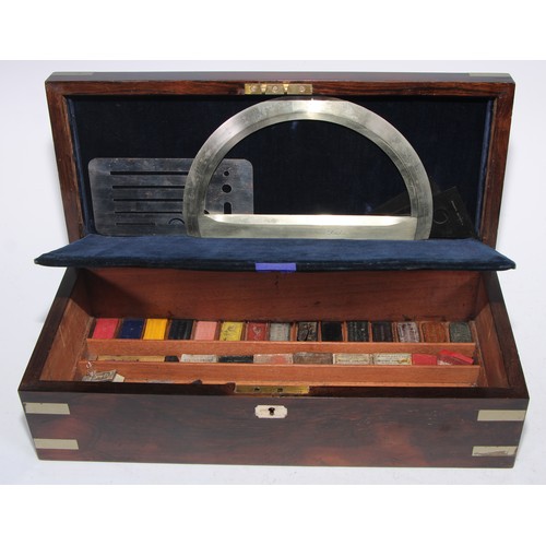 5128 - A large Victorian rosewood draughtsman's box, hinged cover enclosing a fitted interior with a compre... 