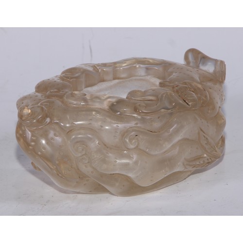 5080 - A Chinese rock crystal scholar's brush washer, carved with qilong, lingzhi and a bat, 15cm wide, 19t... 