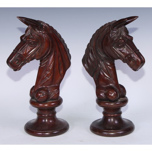 5179 - A pair of early 20th century mahogany oversize chess pieces, possibly advertising shop display model... 