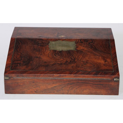 5109 - A George IV rosewood writing box or lap desk, the crossbanded top with hinged cover and fall front, ... 