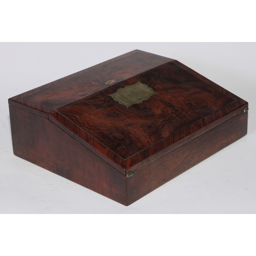 5109 - A George IV rosewood writing box or lap desk, the crossbanded top with hinged cover and fall front, ... 