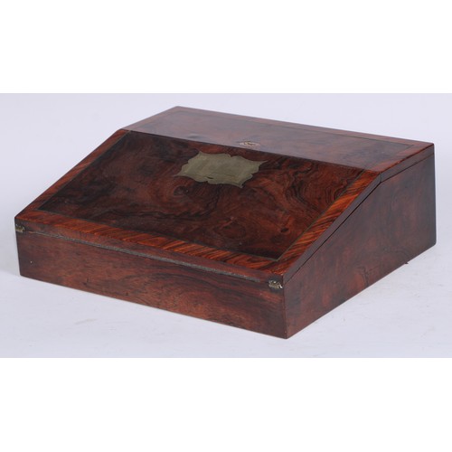 5109 - A George IV rosewood writing box or lap desk, the crossbanded top with hinged cover and fall front, ... 