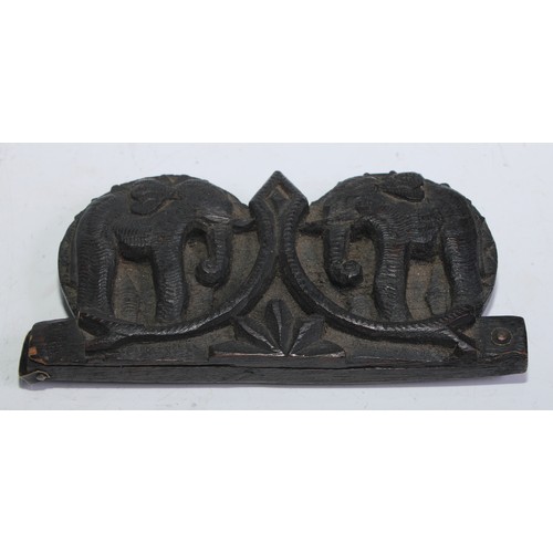 5202 - A set of 19th century Burmese opium scales, the hardwood case carved in relief with elephants, 16cm ... 