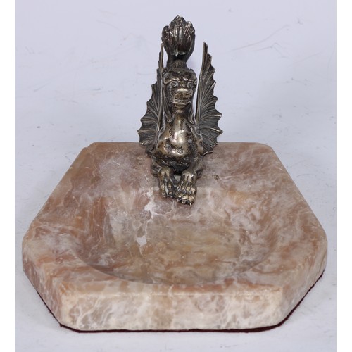 5240 - An alabaster desk tidy, mounted with a silvered wyvern, 15.5cm wide