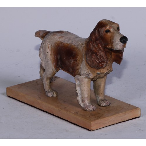 5092 - A Continental cold painted spelter model, of a cocker spaniel, rectangular marble base, 19.5cm long,... 