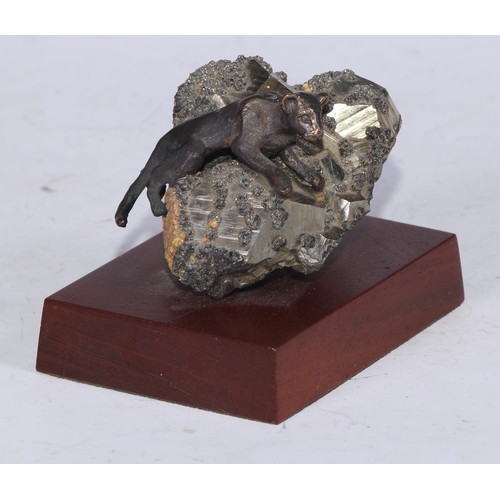 5327 - Geology - a bronze and geological specimen desk sculpture, as a lioness clambering over a galena spe... 