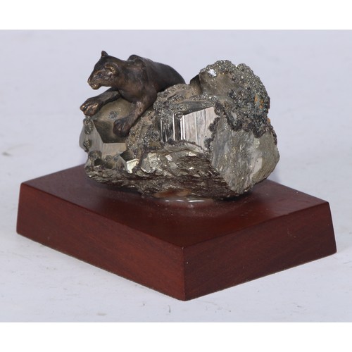 5327 - Geology - a bronze and geological specimen desk sculpture, as a lioness clambering over a galena spe... 