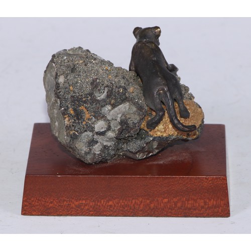 5327 - Geology - a bronze and geological specimen desk sculpture, as a lioness clambering over a galena spe... 