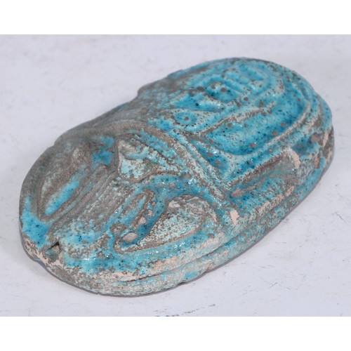 5232 - After the Ancient Egyptian, a faience scarab, in the Grand Tour manner, 8cm long