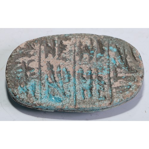 5232 - After the Ancient Egyptian, a faience scarab, in the Grand Tour manner, 8cm long