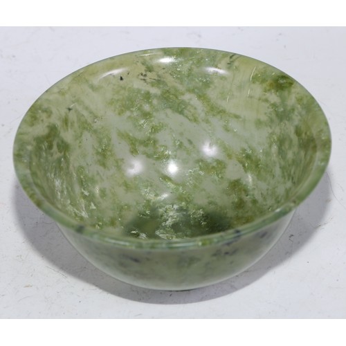 5085 - A Chinese spinach jade bowl, 10.5cm diam