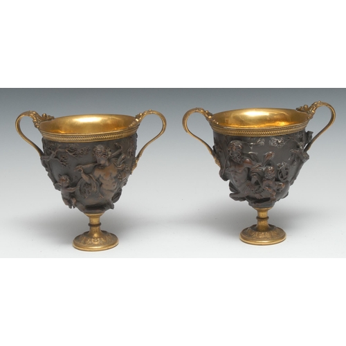 5165 - A pair of 19th century gilt and brown patinated krater vases, facsimiles after the antique, by Elkin... 