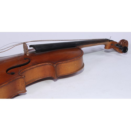 5223 - A violin, the two-piece back 35.75cm long excluding button, ebonised tuning pegs, outlined throughou... 