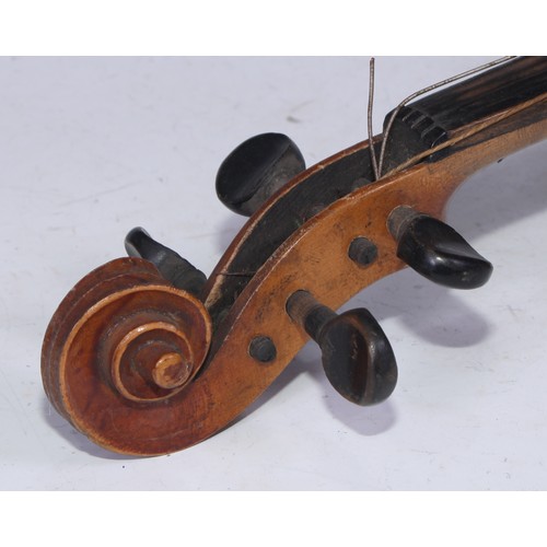 5223 - A violin, the two-piece back 35.75cm long excluding button, ebonised tuning pegs, outlined throughou... 