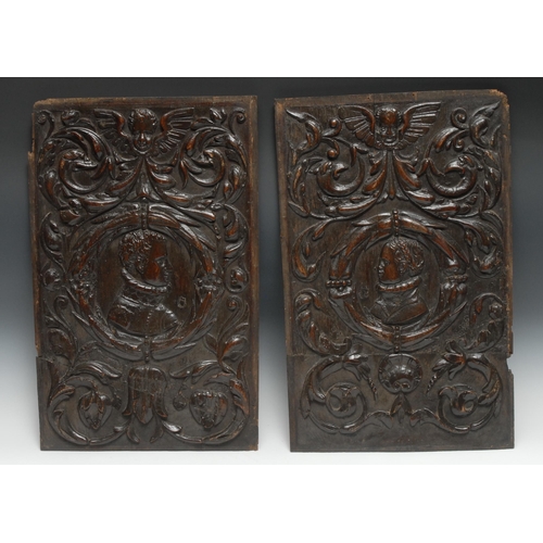 5162 - A pair of 16th century oak Romayne panels, carved in relief with profile portraits, bust-length, fac... 