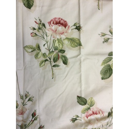 37 - A pair of large floral lined curtains, pale pink roses on a cream ground, 228cm drop, 264cm wide;  a... 