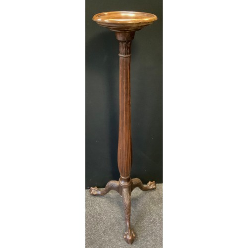 73 - A Victorian style mahogany torchere stand, tapering fluted column, carved tripod ball and claw feet,... 