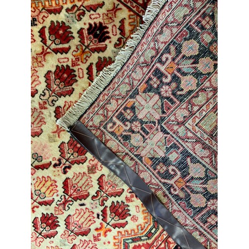 112 - A fine Persian Bidjar wool and silk mix rug / carpet, woven in shades of red, dark brown and ochre, ... 