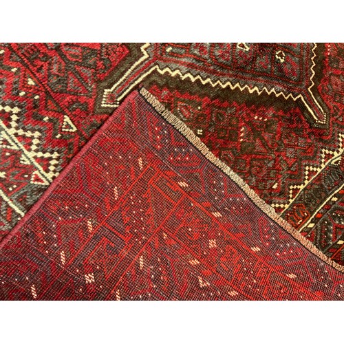 114 - A fine Persian Shiraz woollen rug / carpet, woven with a triple row of medallions within a large cen... 