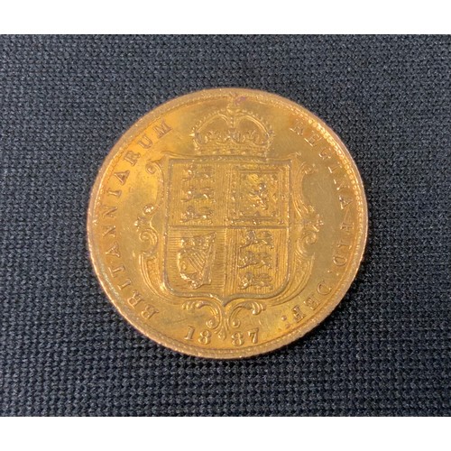 401 - A Victorian shield back half sovereign, 1887, 4g