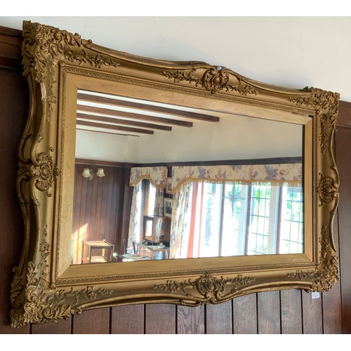 77 - A gilt rectangular mirror, 63cm x 103cm

** We would please ask that all payments are made by 12pm o... 