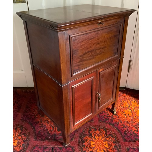 24 - An unusual early 20th century mahogany lady's writing/dressing table, the folding rectangular top op... 