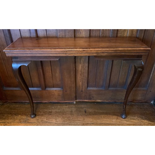 10 - An early 20th century oak hall table, cabriole legs, pad feet, 75cm high, 24cm wide, c.1920

** We w... 