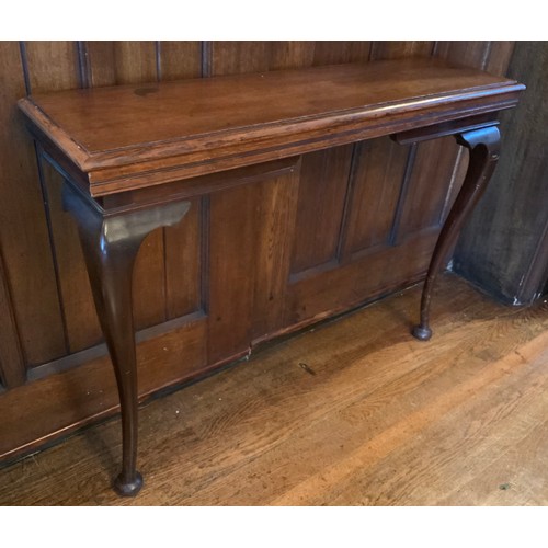 10 - An early 20th century oak hall table, cabriole legs, pad feet, 75cm high, 24cm wide, c.1920

** We w... 