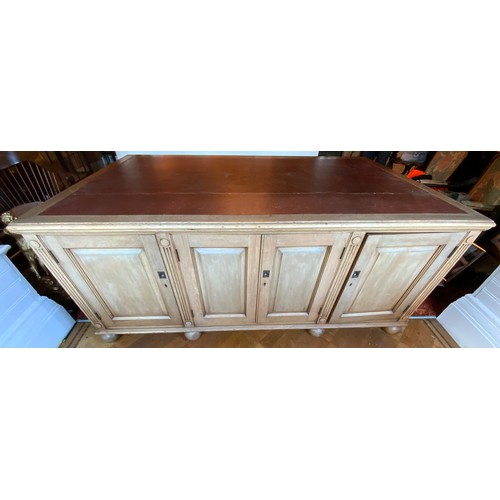 27 - A late 19th/early 20th century mahogany partners desk, tooled leather writing surface, central drawe... 