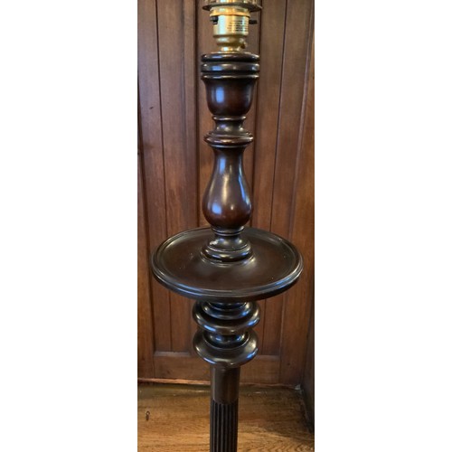 43 - An early 20th century mahogany standard lamp, reeded column, tripod legs, pad feet


** We would ple... 