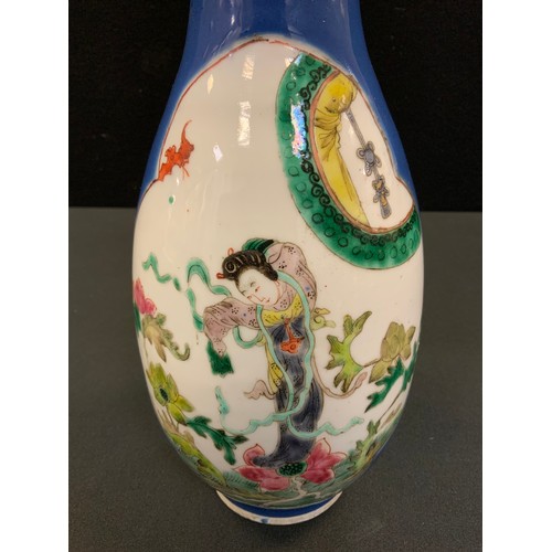 13 - A Chinese slender ovoid vase, decorated with two shaped cartouches each with oriental figures and pa... 