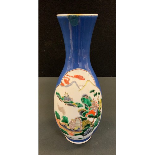 13 - A Chinese slender ovoid vase, decorated with two shaped cartouches each with oriental figures and pa... 