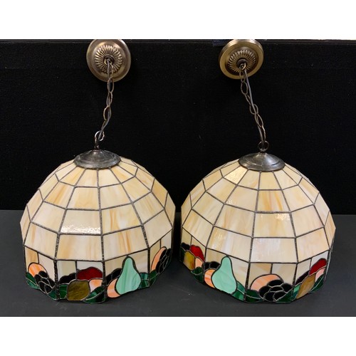 86 - A pair of stained and leaded marbleized glass light fittings, dodecagonal body with Fruit collar of ... 