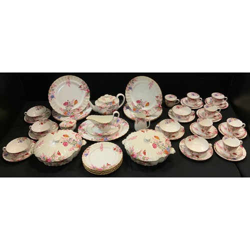 97 - A Spode Chelsea Garden tea and dinner service, for six, comprising teacups, saucers, side plates, di... 