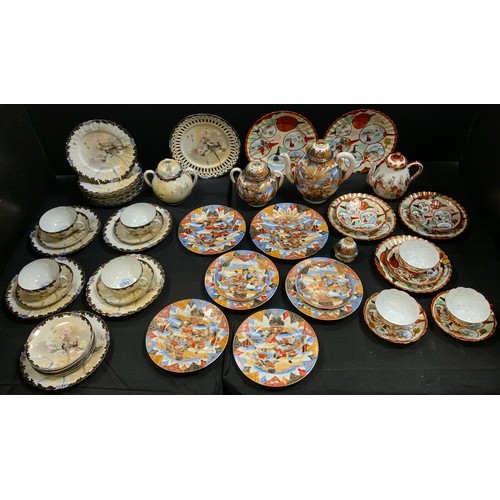 148 - A Japanese eggshell porcelain part tea service intricately decorated with traditional birds and foli... 