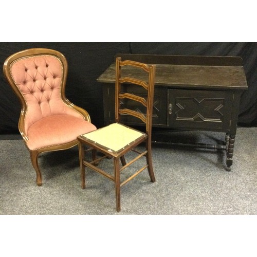 152 - A 20th century oak side table, half gallery, oversailing rectangular top above a pair of cupboard do... 