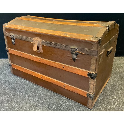 170 - An early 20th century dome topped leather and wooden metal bound travelling trunk, 50 cm high, 88cm ... 