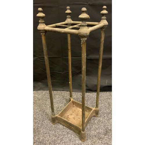 80A - A laquered brass four section stick stand, c.1900